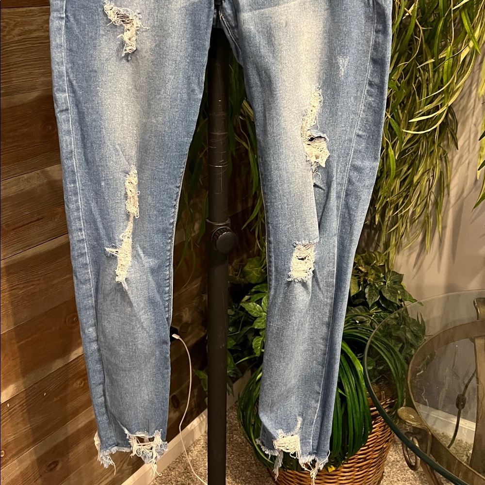 Express destructed mid rise skinny jeans. 10 - Picture 3 of 5